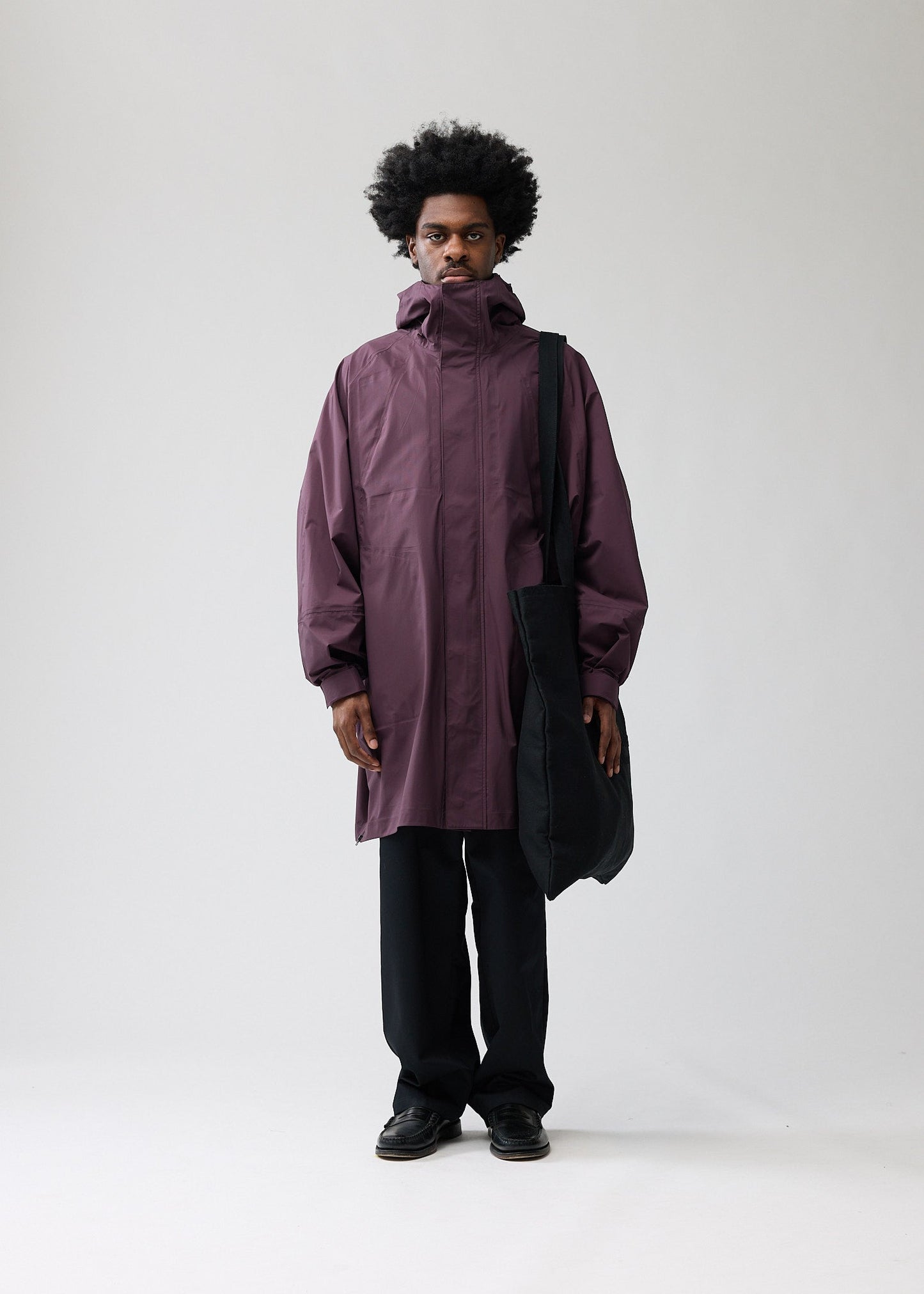 TECHNICAL RAIN JACKET