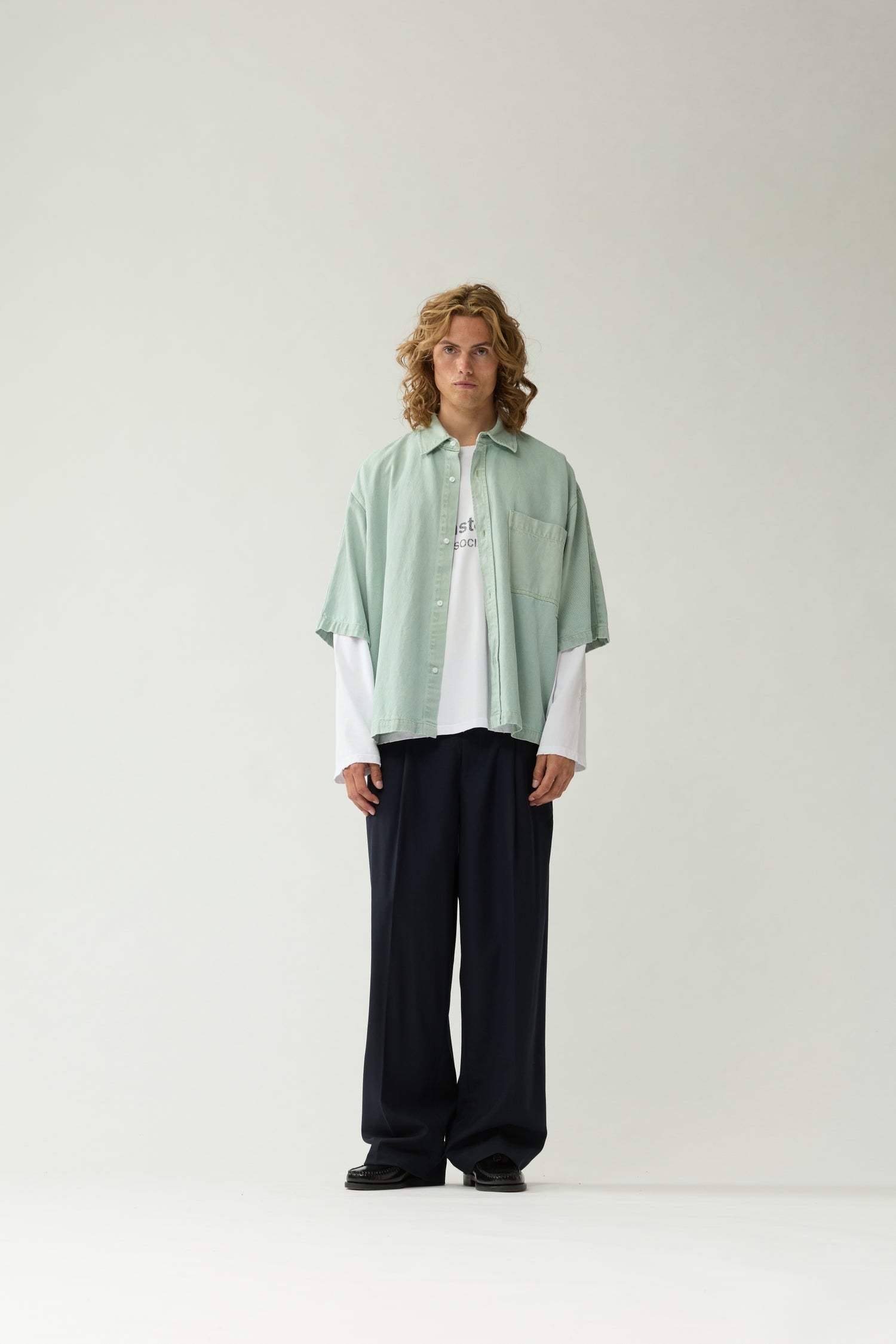 New Amsterdam Surf Association Mint Denim Short Sleeve Button-Up Shirt - Model Wearing Front View Full Body