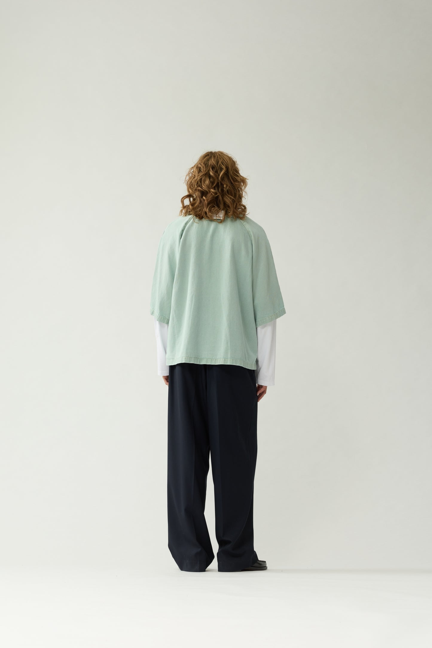 New Amsterdam Surf Association Mint Denim Short Sleeve Button-Up Shirt - Model Wearing Back View Full Body