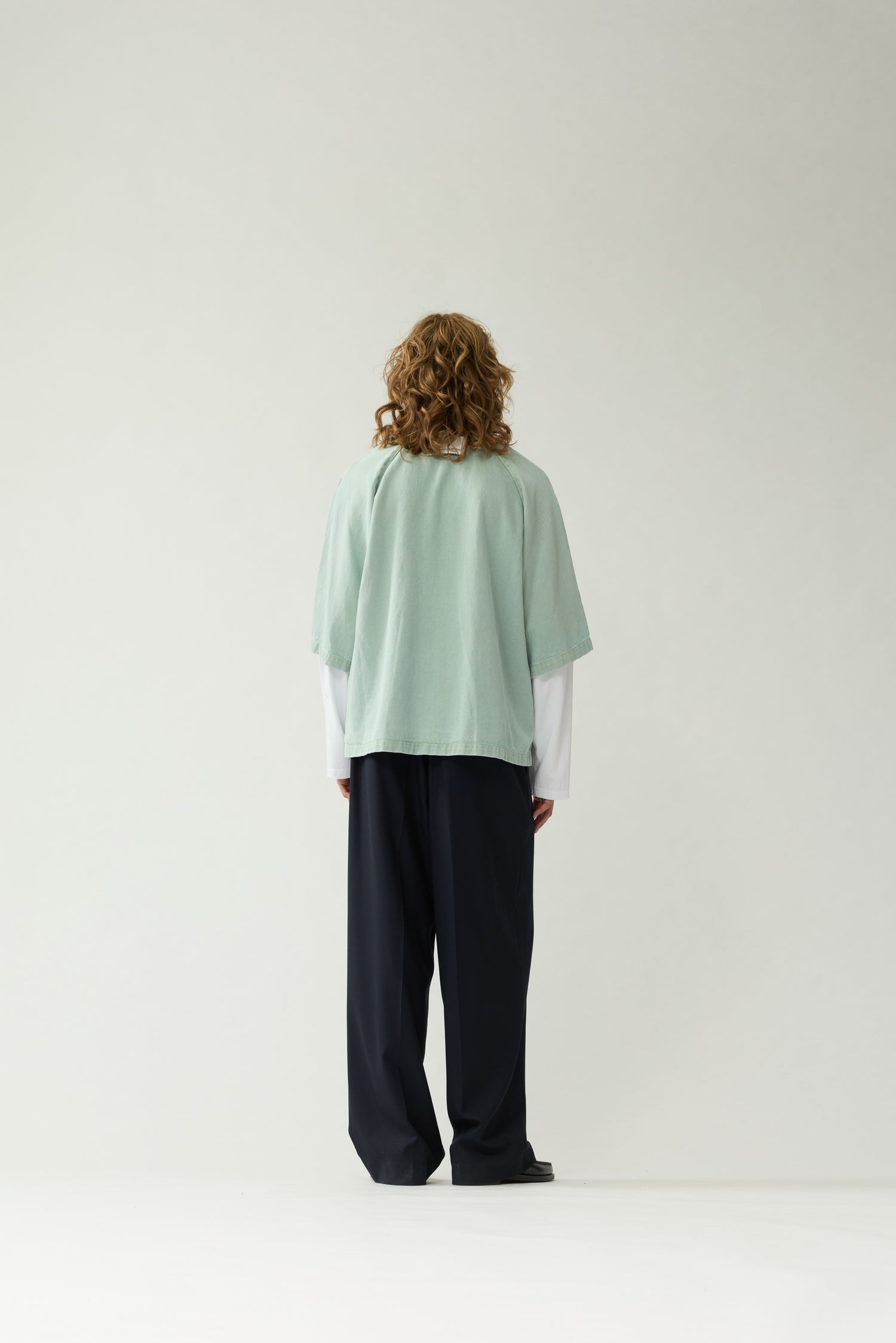 New Amsterdam Surf Association Mint Denim Short Sleeve Button-Up Shirt - Model Wearing Back View Full Body