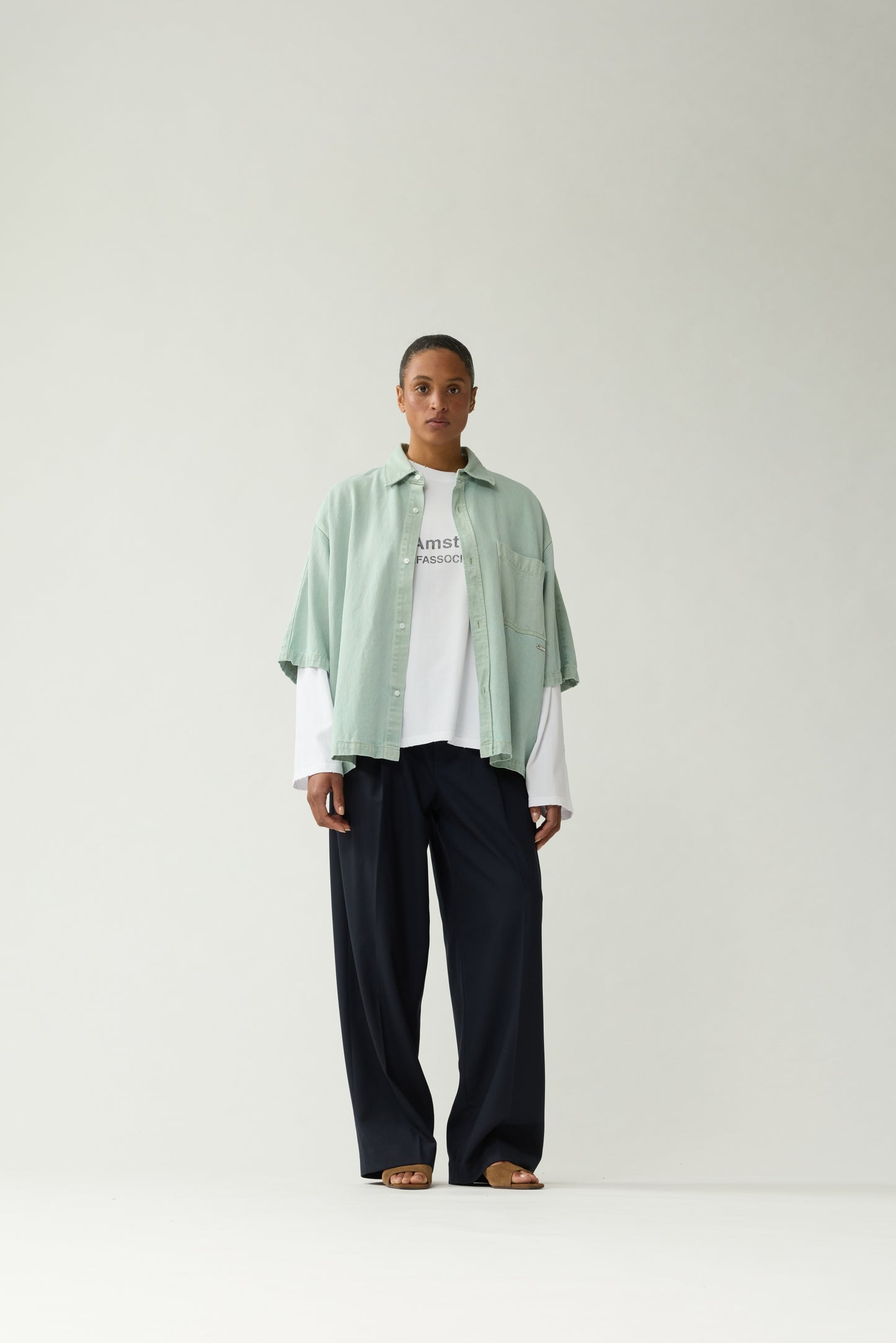 New Amsterdam Surf Association Mint Denim Short Sleeve Button-Up Shirt - Model Front View Relaxed Oversized Fit Streetwear