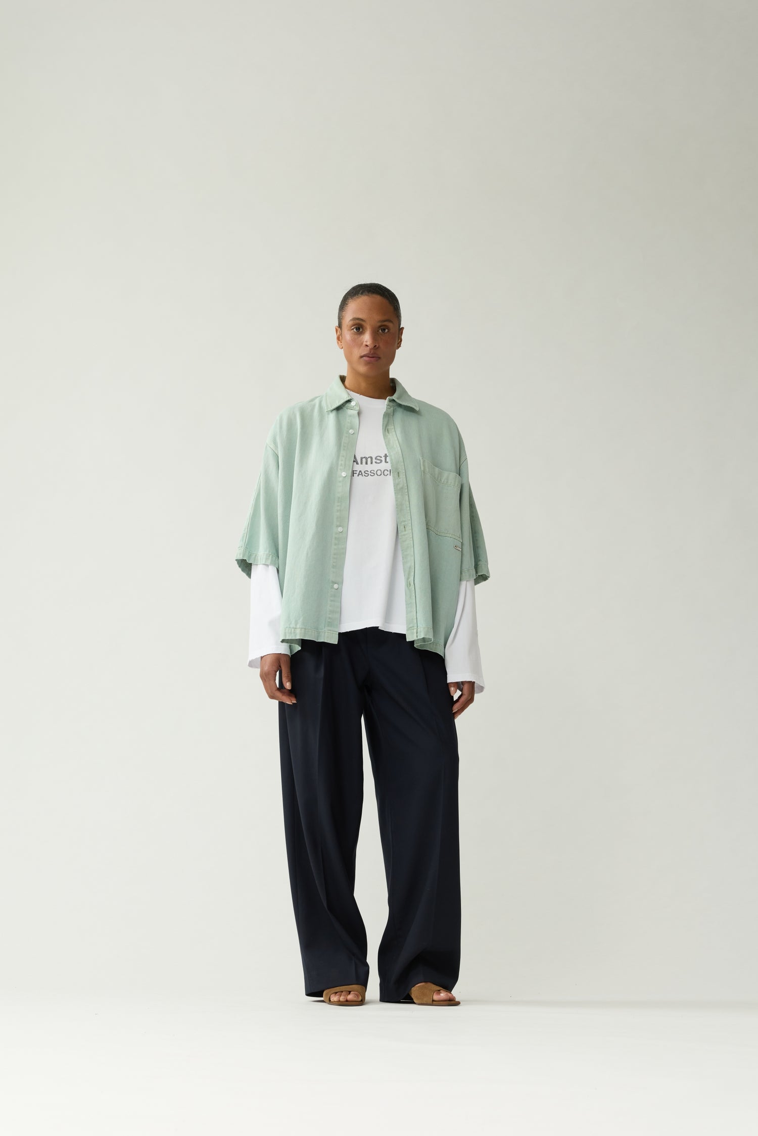 New Amsterdam Surf Association Mint Denim Short Sleeve Button-Up Shirt - Model Front View Relaxed Oversized Fit Streetwear