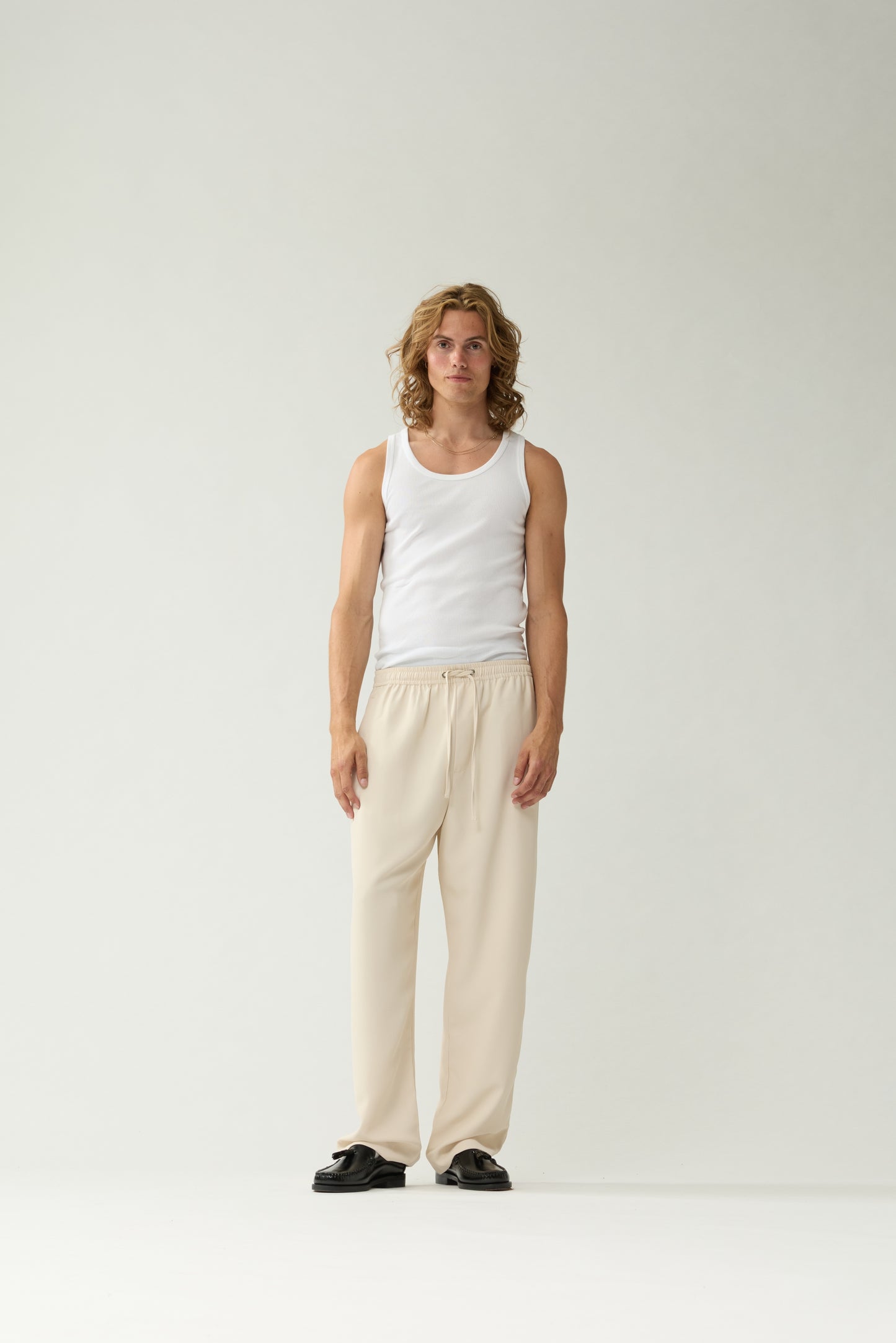 New Amsterdam Surf Association Sand Work Trousers - Model Front View Full Body Relaxed Fit Casual Pants