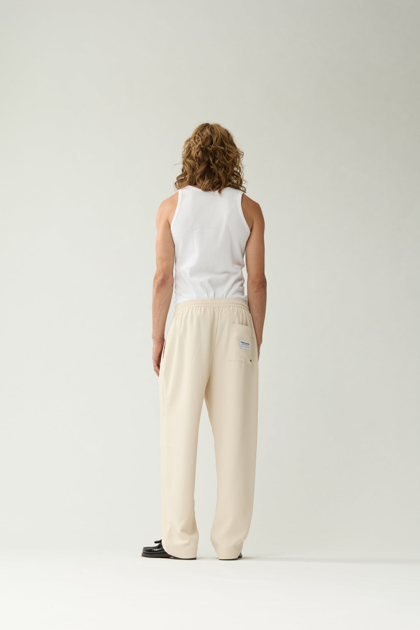 New Amsterdam Surf Association Sand Work Trousers - Model Back View Full Body Wide Leg Straight Cut Pants