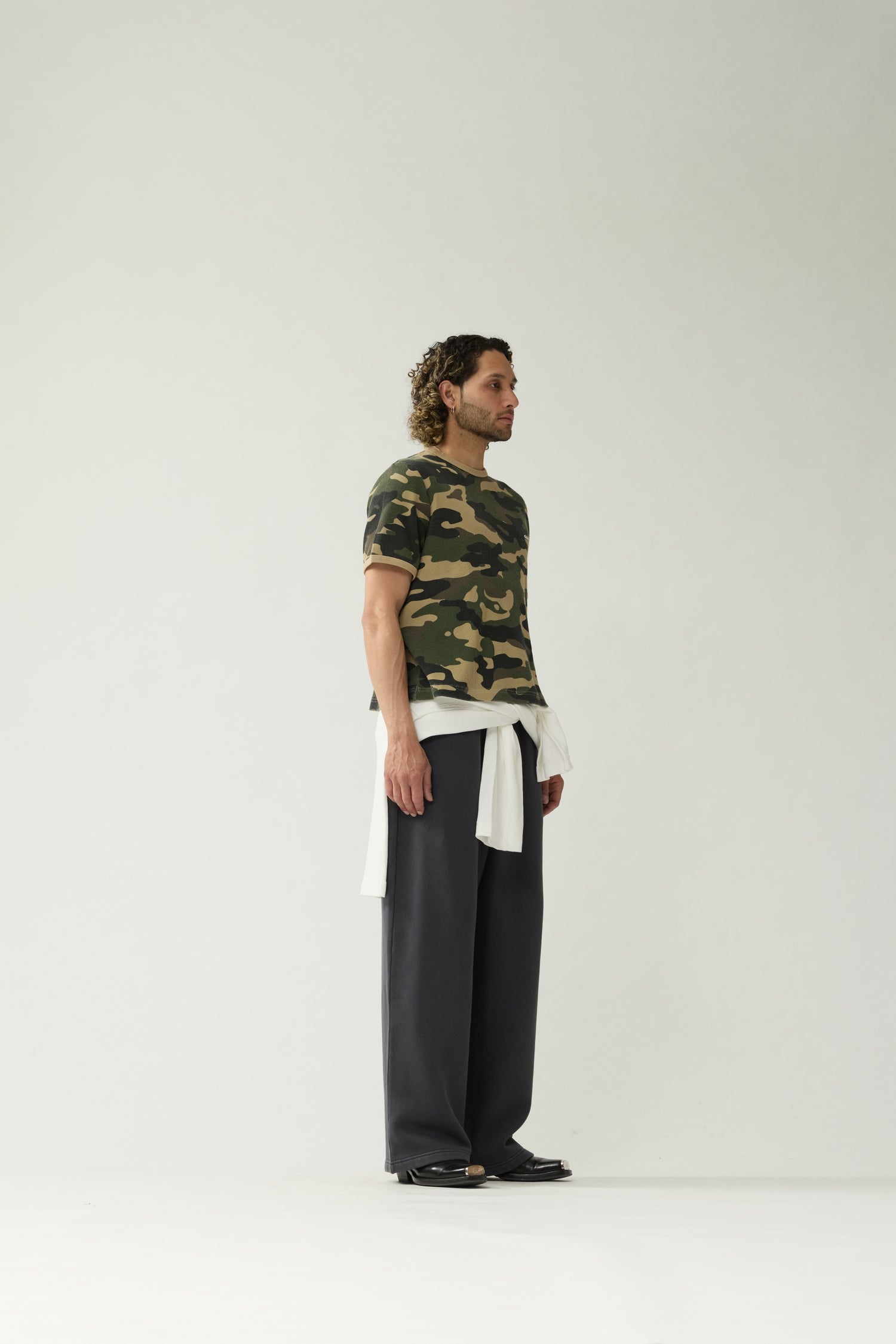New Amsterdam Surf Association Camo Waffle Tee - Model Side Profile View Oversized Fit Camouflage T-Shirt