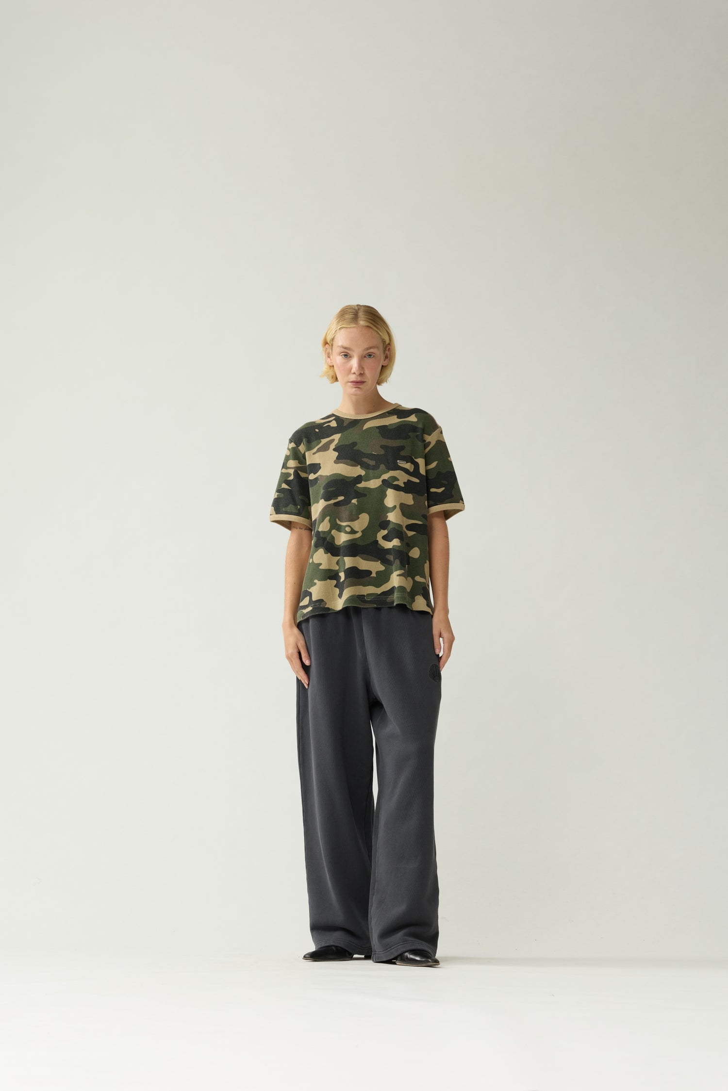 New Amsterdam Surf Association Camo Waffle Tee - Model Front View Unisex Oversized Camouflage Tee Streetwear