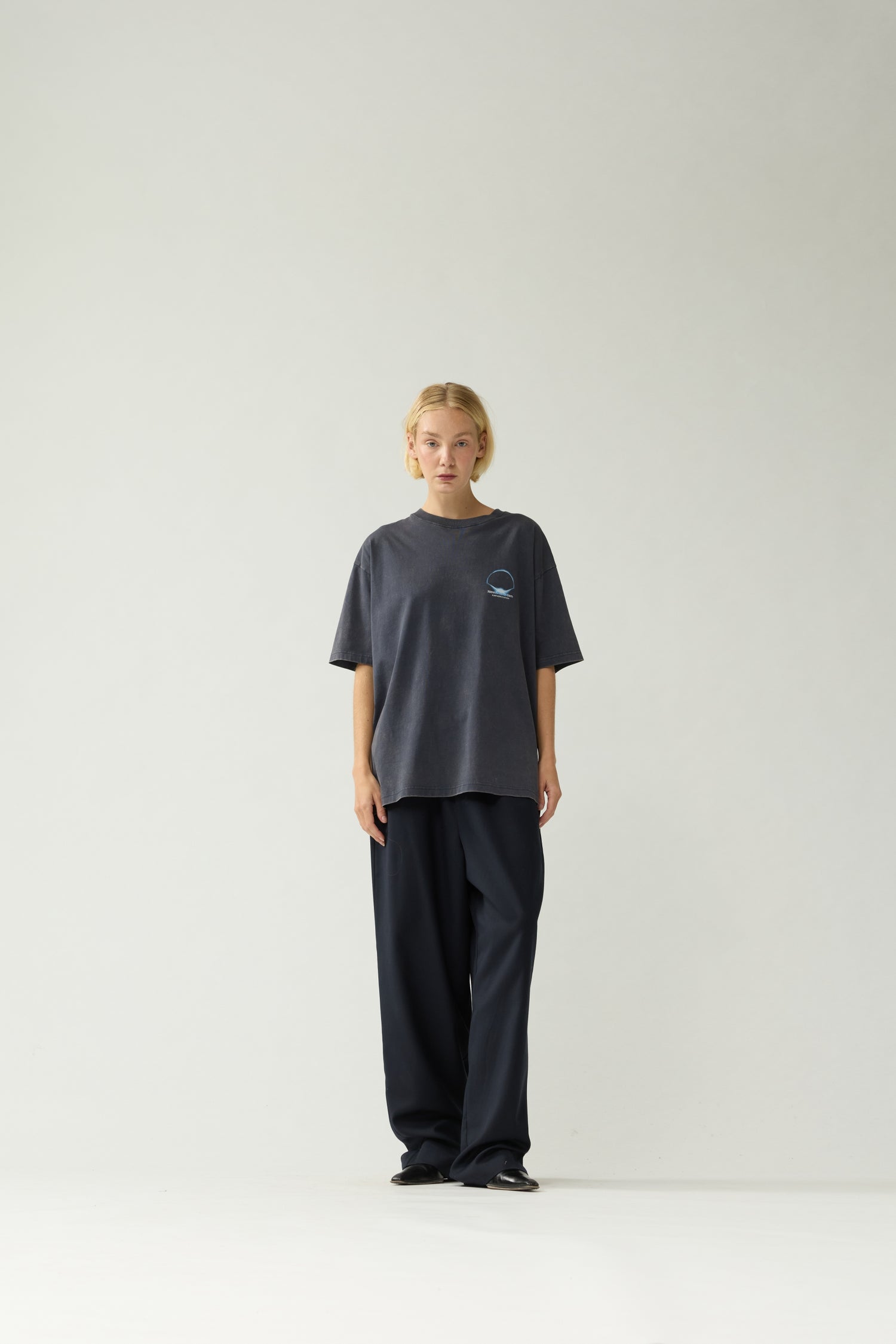 New Amsterdam Surf Association Eclipse Tee in Night — Women model wearing dark navy unisex crewneck tee, [front/back/side] detail view